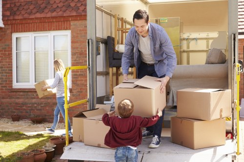 Moving van and packed boxes outside a Camden residential property