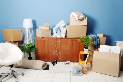 Furniture removal team handling a sofa move in Camden