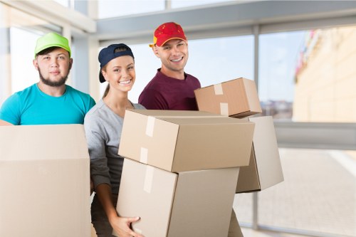 Worker assessing a property move with safety awareness