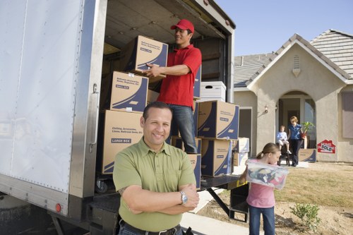 Careful loading of belongings into a moving truck in Camden