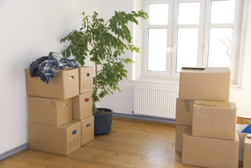 Packed moving boxes ready for a home relocation in Camden