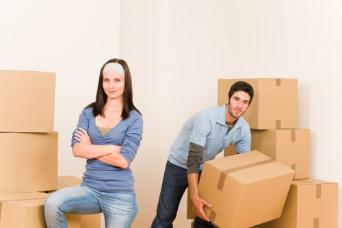 Local team collecting bulky furniture with care