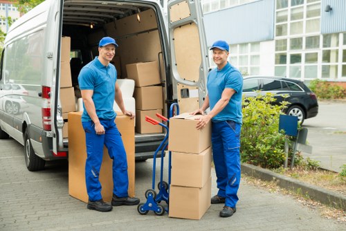 Boxes and furniture being loaded carefully for urgent removals in Camden