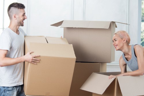 Furniture being carried through a Camden apartment building