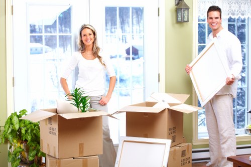 Loading household items into a moving van during relocation