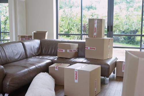Carefully labelled cartons ready for a residential move in Camden